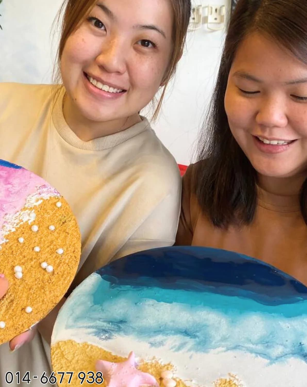 Adult students with ocean texture artwork at Rycca art class