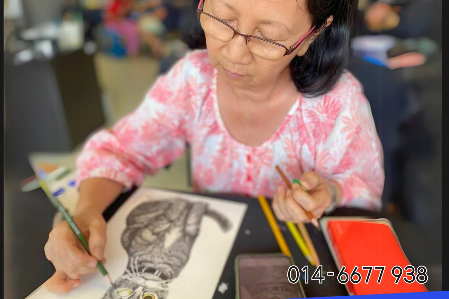 Adult student working on pencil portrait drawing at Rycca Painting Class