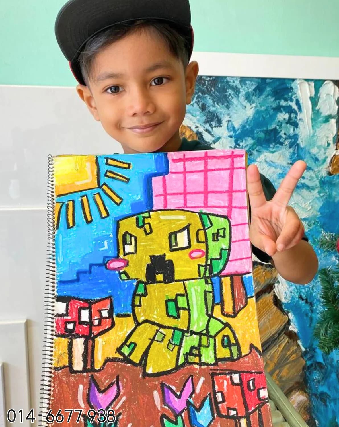 Boy holding colourful city painting from Rycca painting class