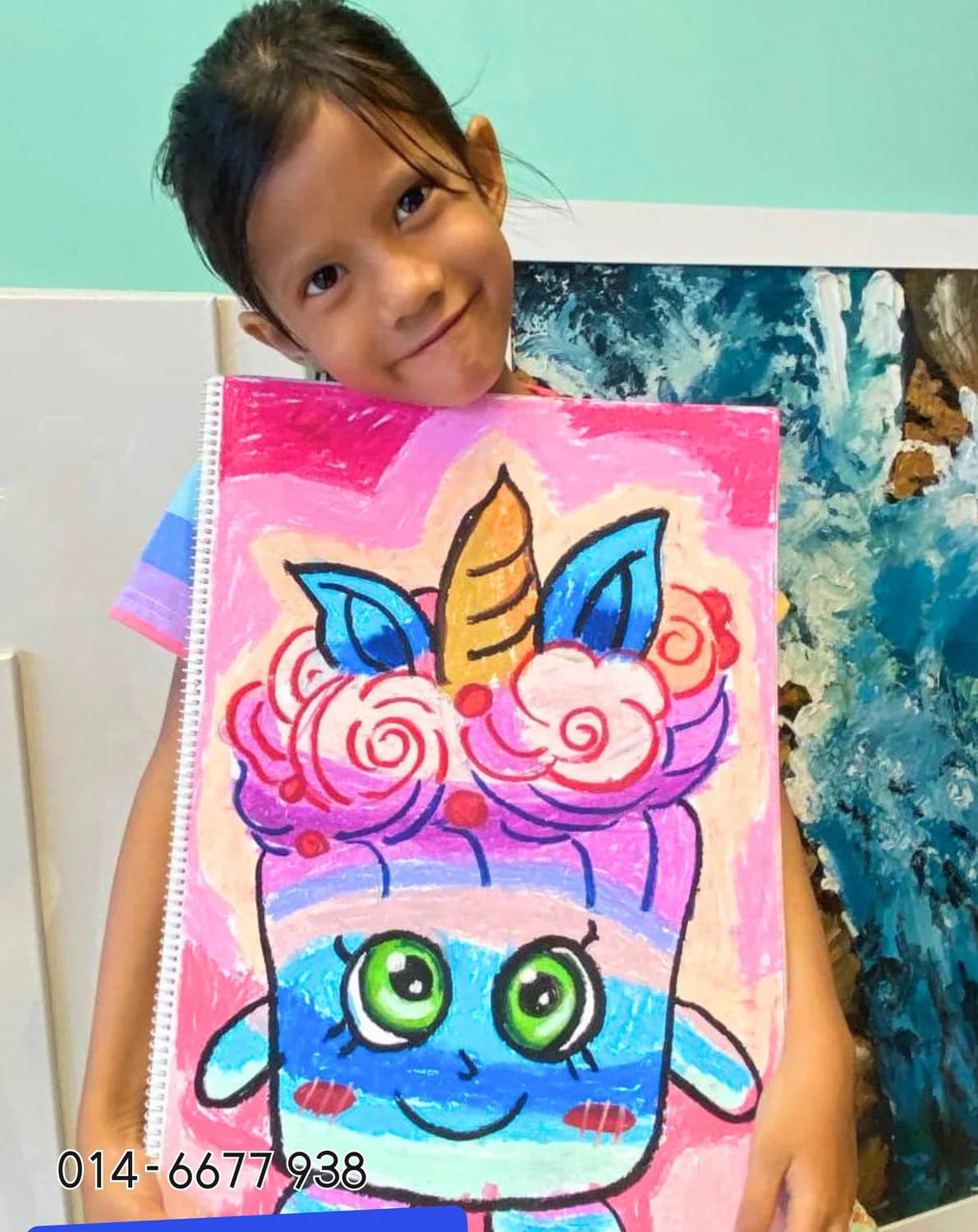 Girl presenting colourful unicorn cartoon art at Rycca kids class